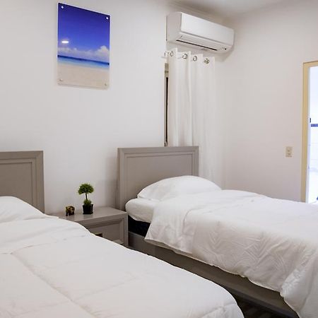 Villa Noah Palm Beach Bagian luar foto