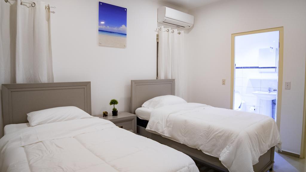 Villa Noah Palm Beach Bagian luar foto