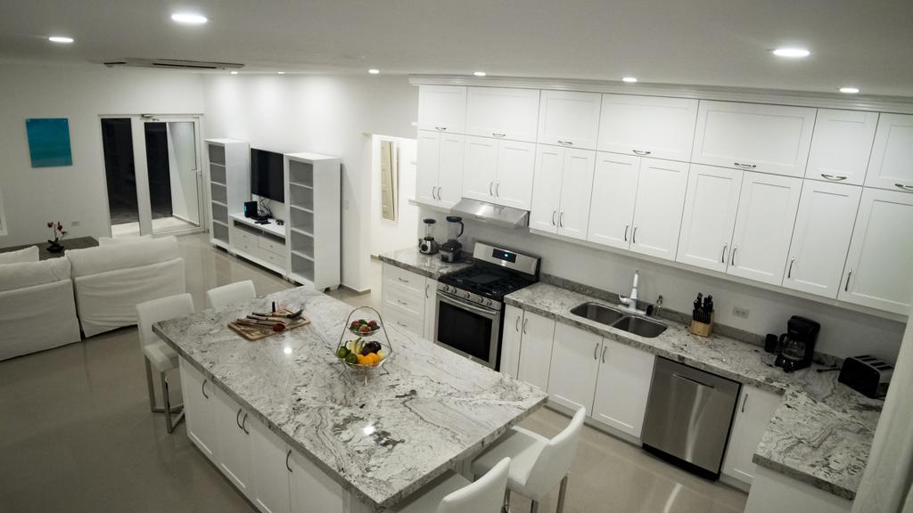 Villa Noah Palm Beach Bagian luar foto