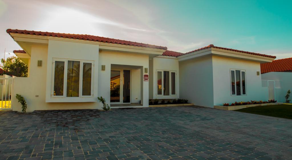 Villa Noah Palm Beach Bagian luar foto