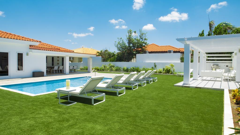 Villa Noah Palm Beach Bagian luar foto